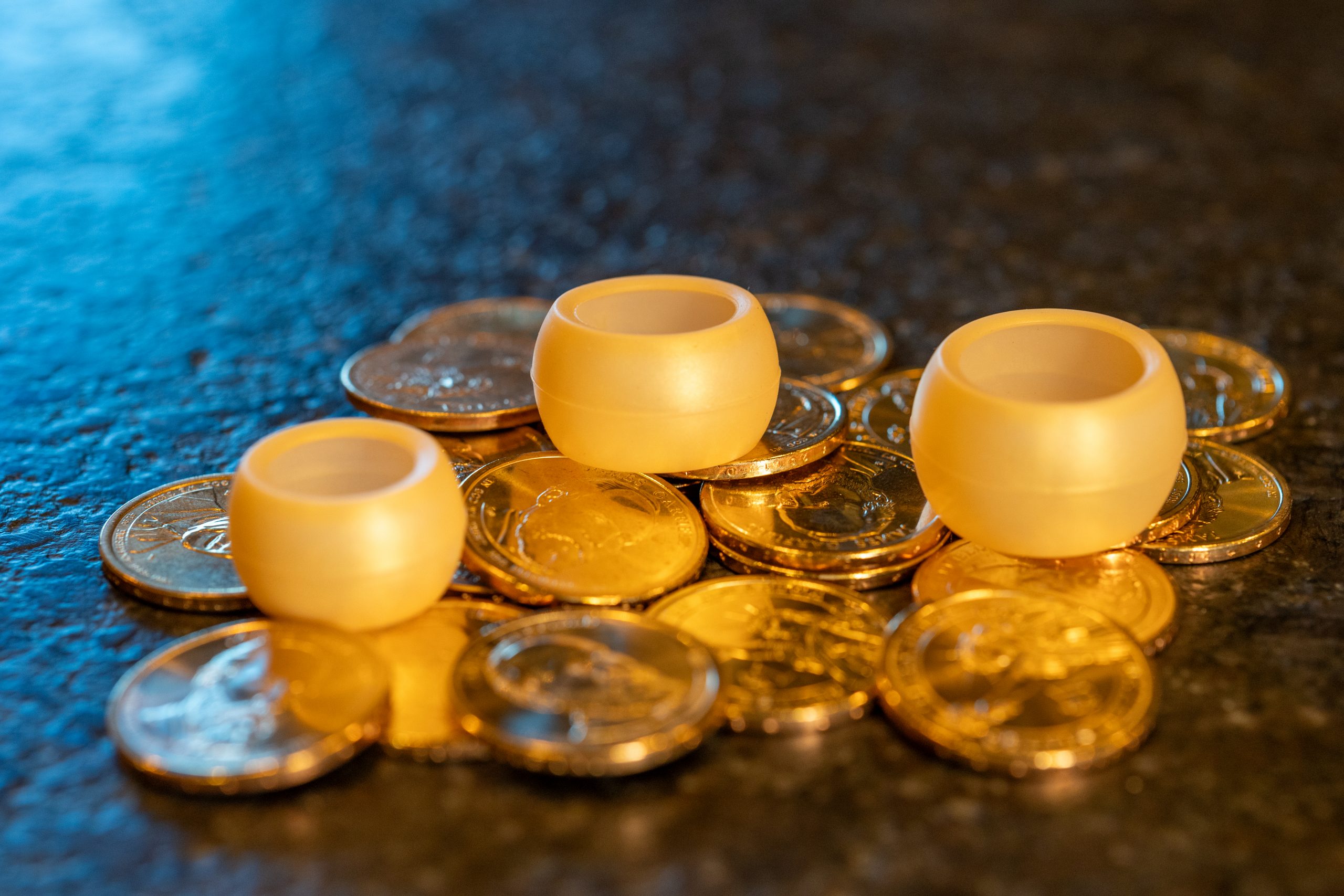 Gold Ring Wrapper silicone ring cover shown worn over a ring