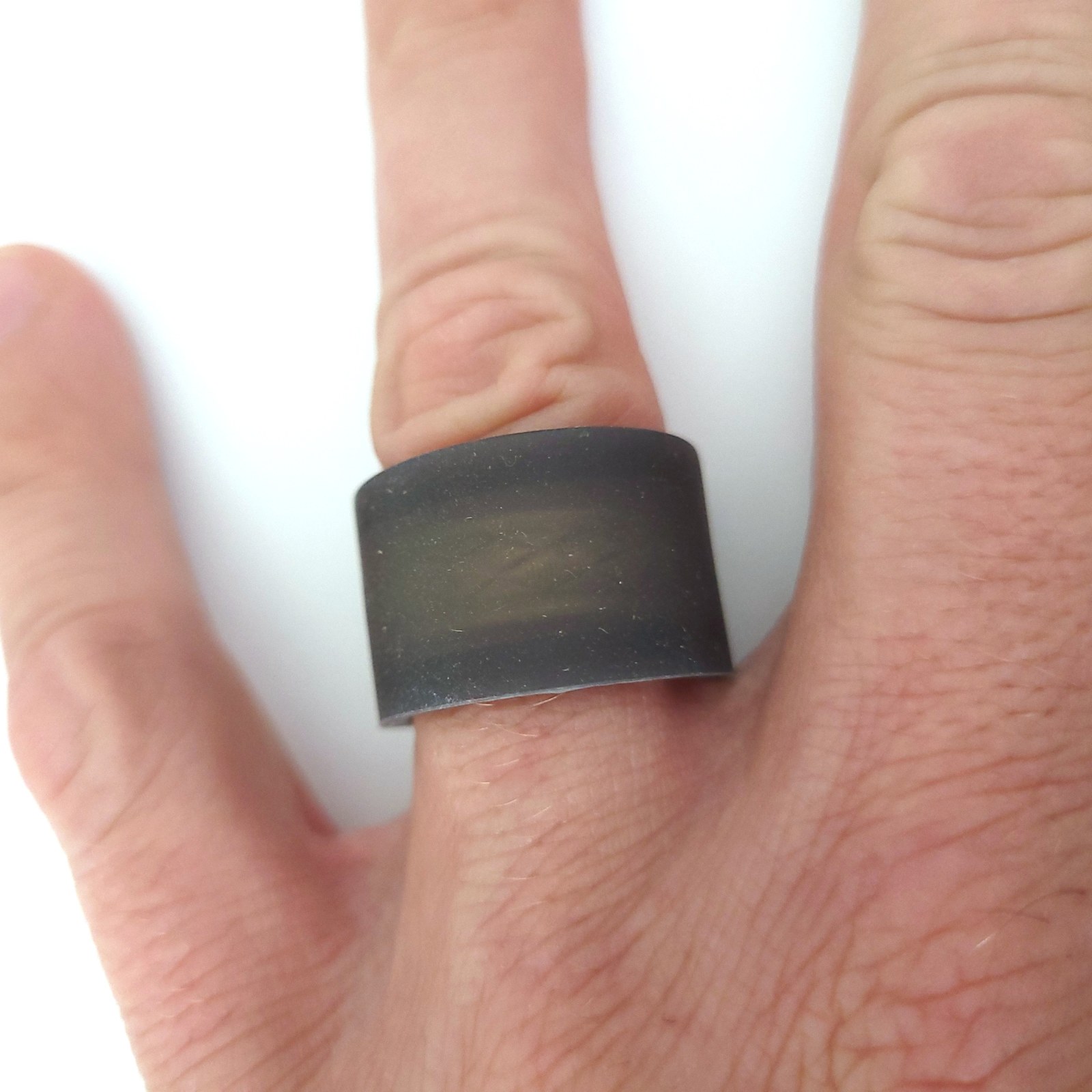 Black Ring Wrapper Original silicone ring cover worn on a finger
